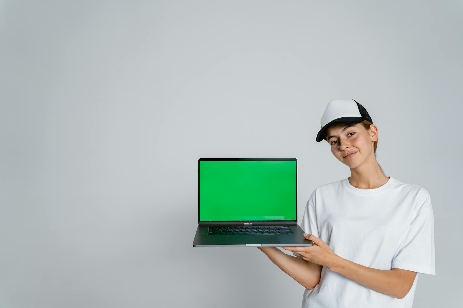 Woman editing presentation slides on a laptop