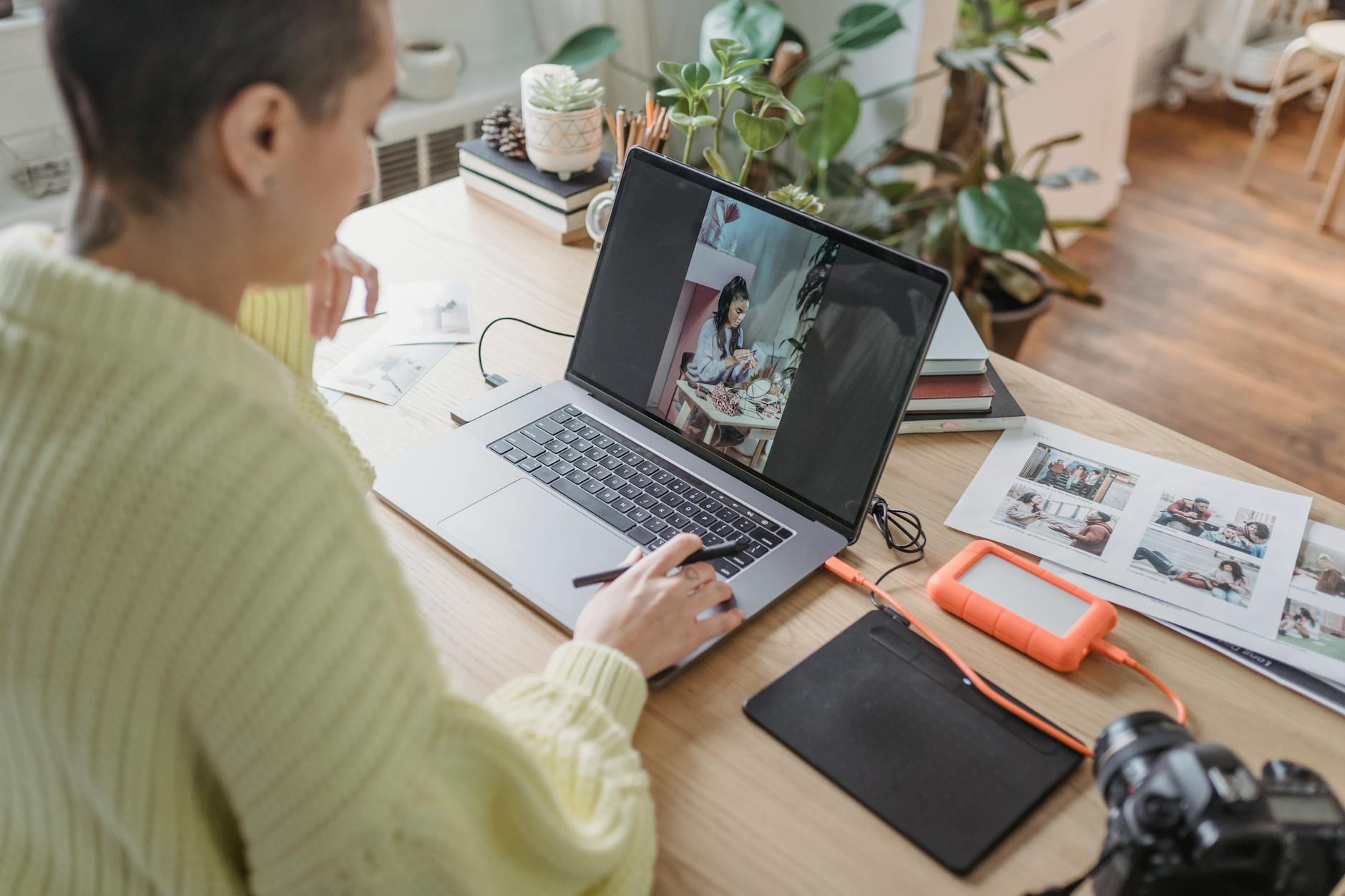 Canva Edit Image panel open on a laptop with the Background Remover button highlighted