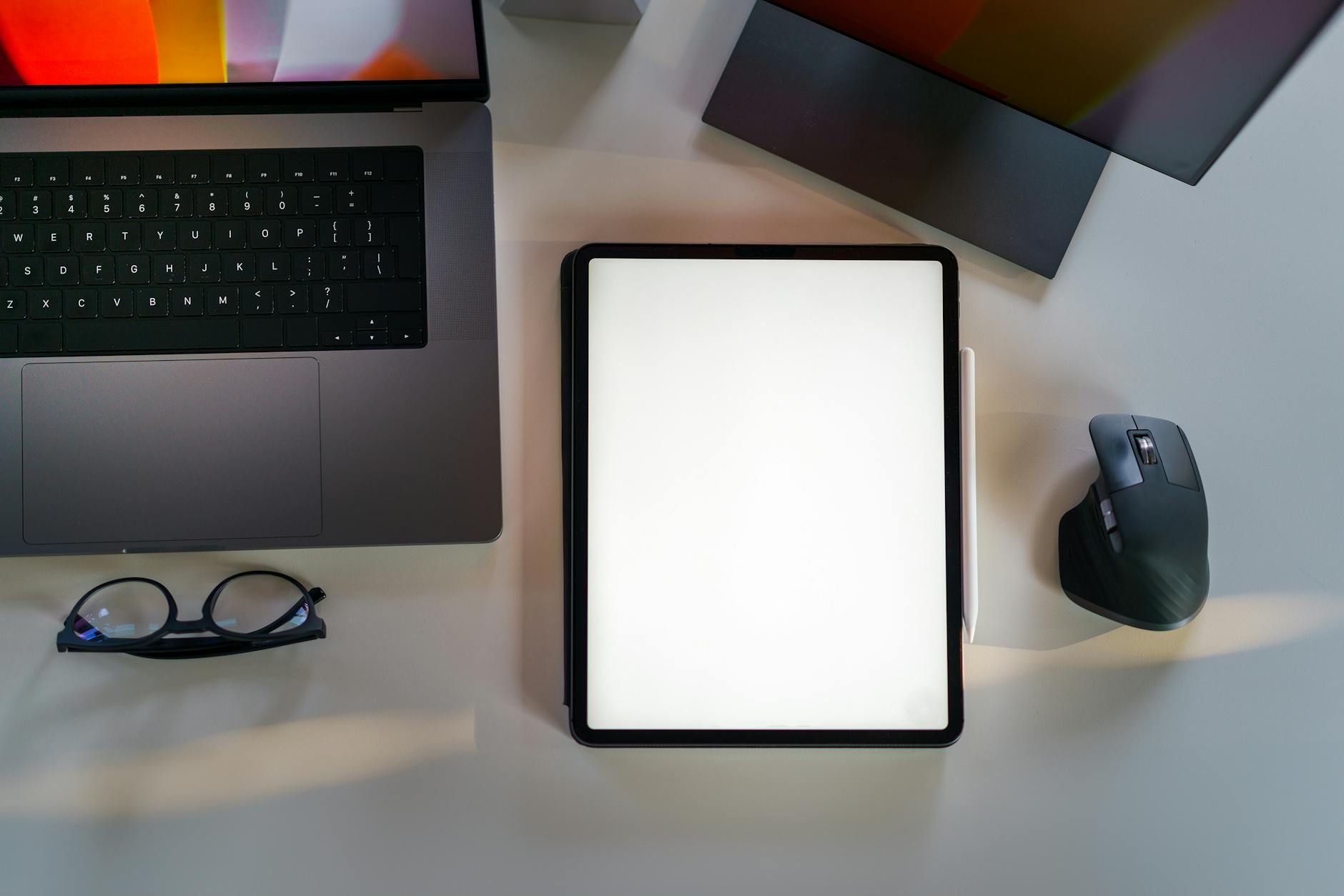 A laptop showing an ebook lead magnet design on a desk