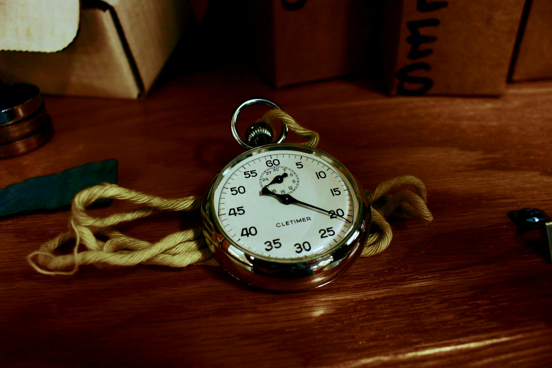 A stopwatch on a desk representing PowerPoint transition timing settings
