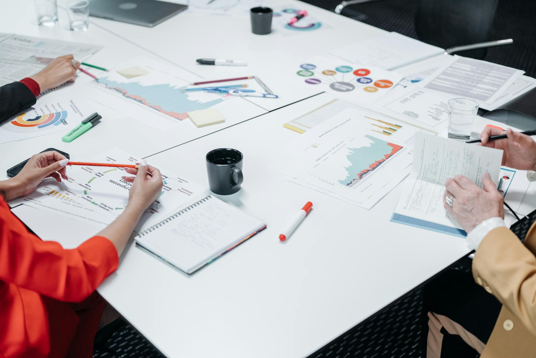 A team comparing report formats before a Monday board meeting