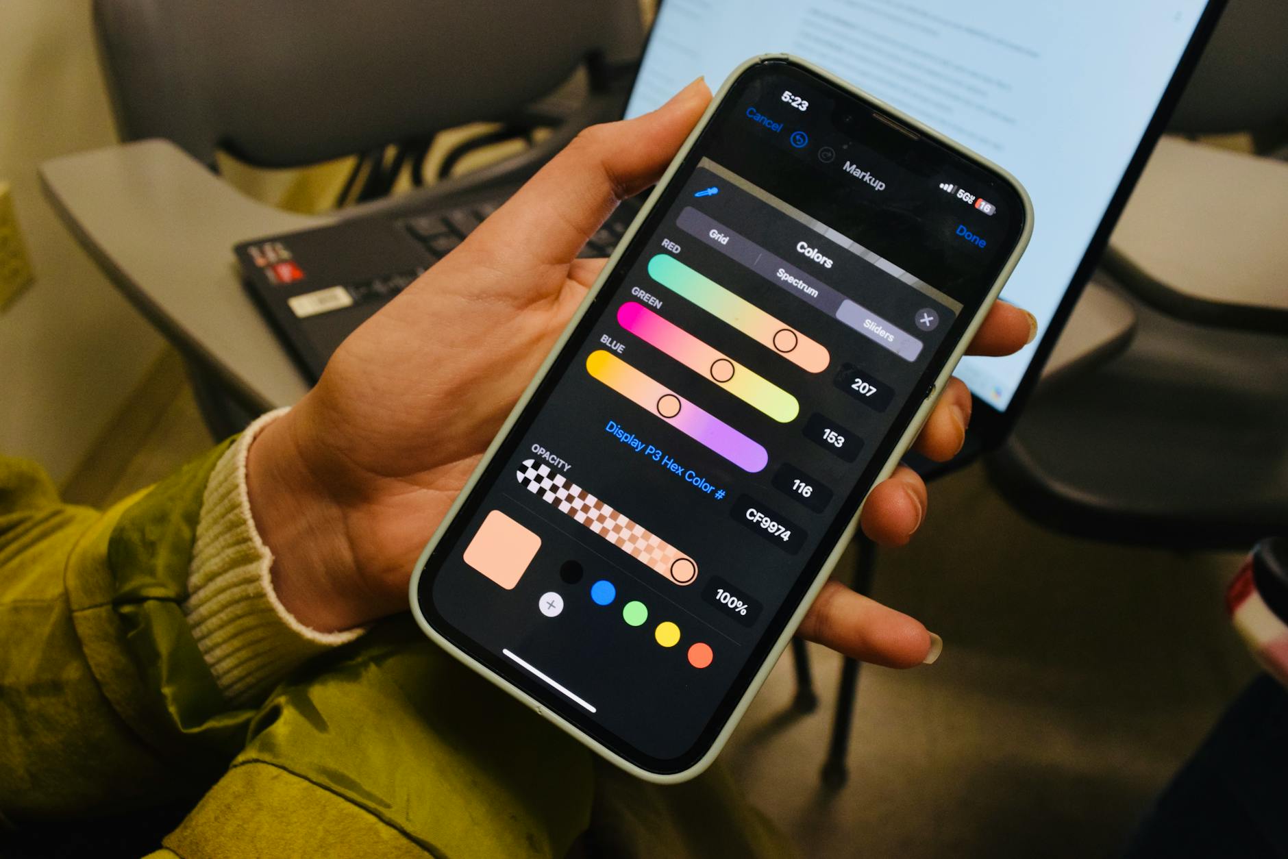 Designing in the Canva mobile app on a smartphone