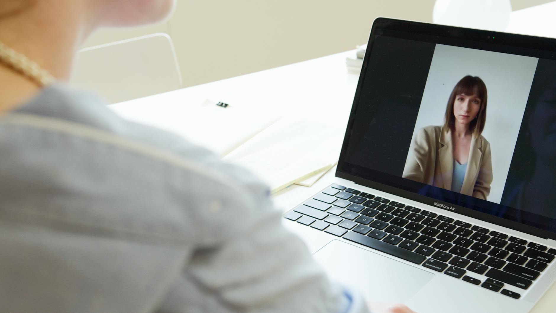 A video meeting on a laptop, ready to present slides on Zoom or Teams